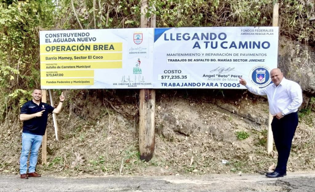 Municipios de Aguada y Moca trabajan juntos en asfaltado de vías públicas, alcaldes señalan beneficios del trabajo en conjunto